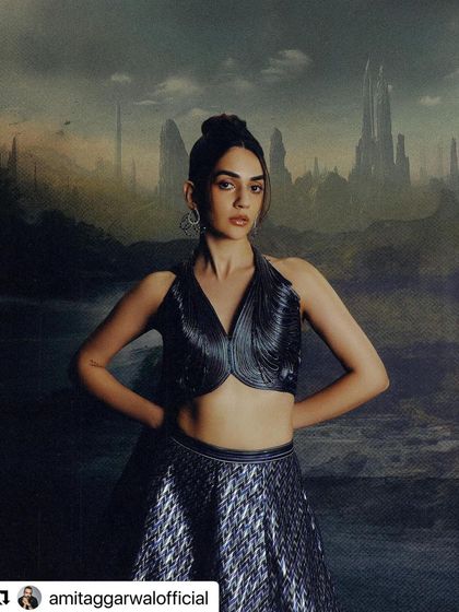 A sleek and powerful high bun for a futuristic campaign with designer Amit Aggarwal. This style creates a strong, clean silhouette that complements the structural design of the outfit.