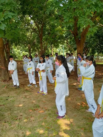 A group of our yellow belt students lined up during the national technical seminar, ready to learn.
