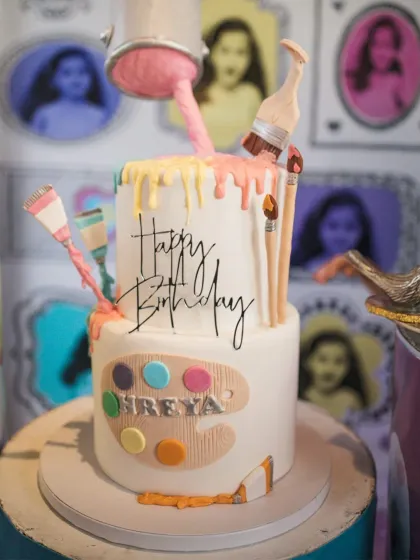 For me, every detail of a party matters, right down to the cake. This custom-designed, art-themed birthday cake, complete with a paint palette and dripping colors, was the perfect centerpiece for a young artist's celebration.