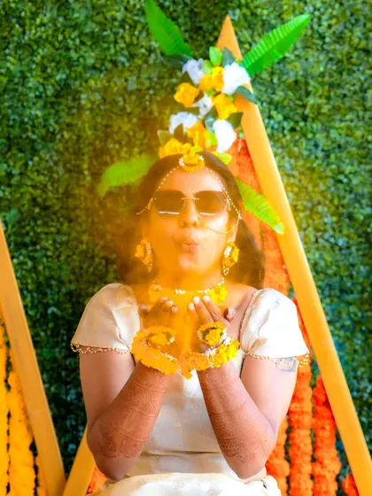 The Haldi ceremony is all about fun, laughter, and color! I capture these playful, candid moments as the bride enjoys the celebration, creating photos full of joy and energy.