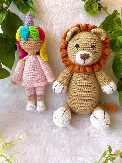 This large lion in a soft beige color is so huggable. His gentle expression and soft mane make him a comforting friend for children.