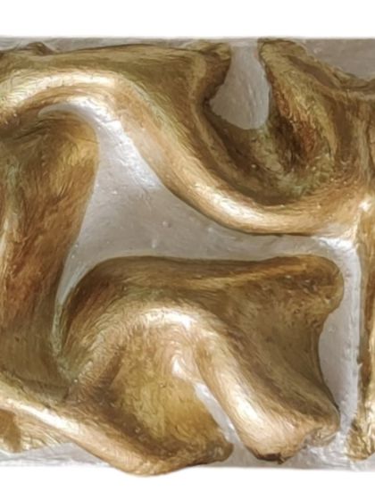 Here is a close-up of a gold-tinted performer. These pieces are daring and luminous, adding individual flair to the collective flow of the artwork.