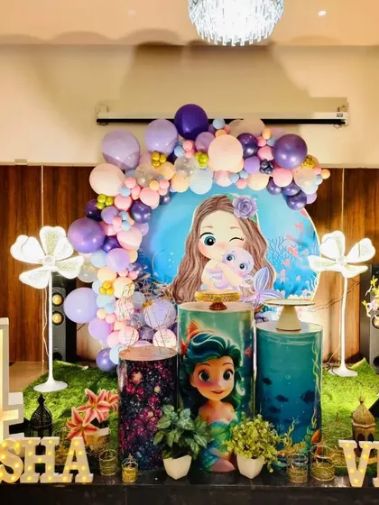 A clearer, centered view of the joint mermaid birthday party setup.