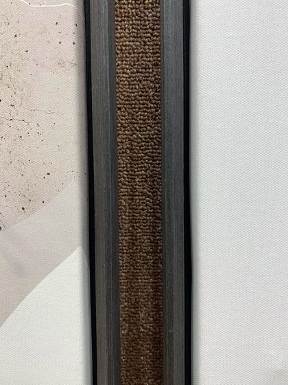 A close-up of the textured inner edge of our veneer floater frame, adding a subtle, sophisticated detail to the overall design.