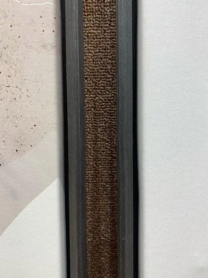 A close-up of the textured inner edge of our veneer floater frame, adding a subtle, sophisticated detail to the overall design.