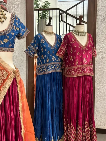 A detailed shot of the embroidered blouses and crushed silk skirts. I focus on providing a variety of textures and styles to suit different tastes.