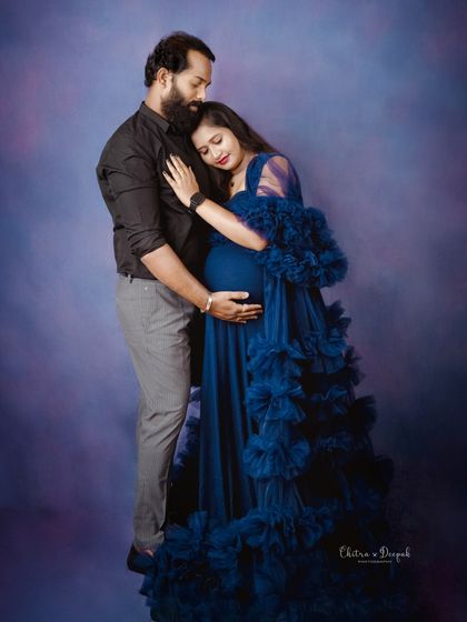 A tender embrace. This pose is full of emotion and beautifully captures the love and support between the expecting parents.