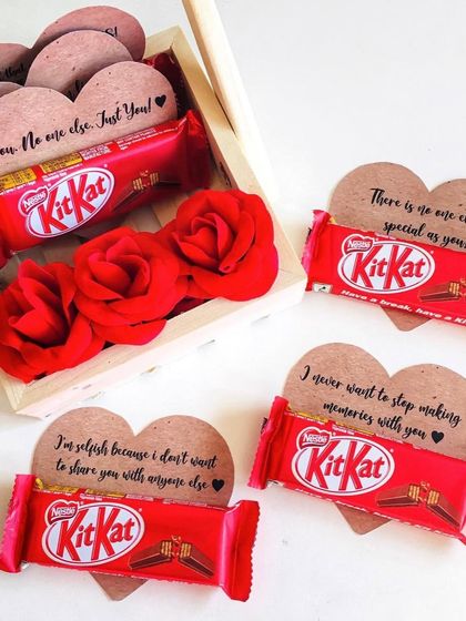 A sweet way to express your feelings. These KitKat chocolates are attached to heart-shaped cards with romantic messages, perfect for adding to any hamper.