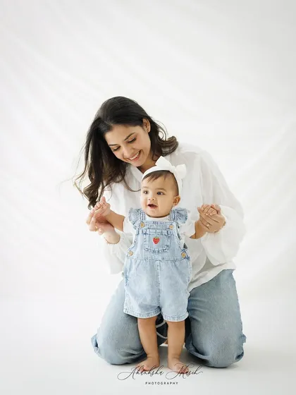 A duplicate image that continues to showcase the beautiful, natural interaction between this mother and her daughter.