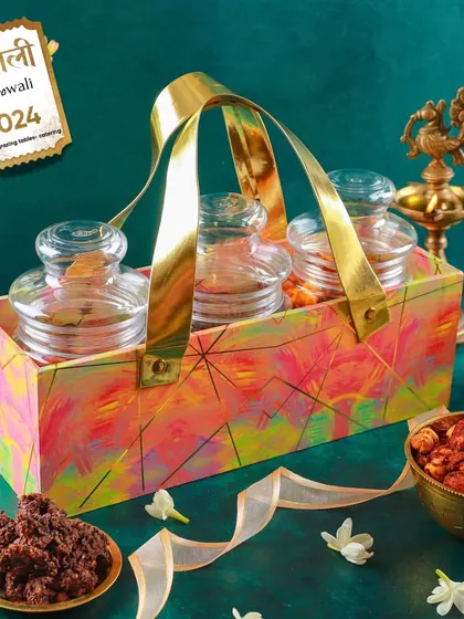 Our vibrant, colorful three-jar caddy, filled with delicious treats. The packaging itself is a work of art, making it a memorable gift.