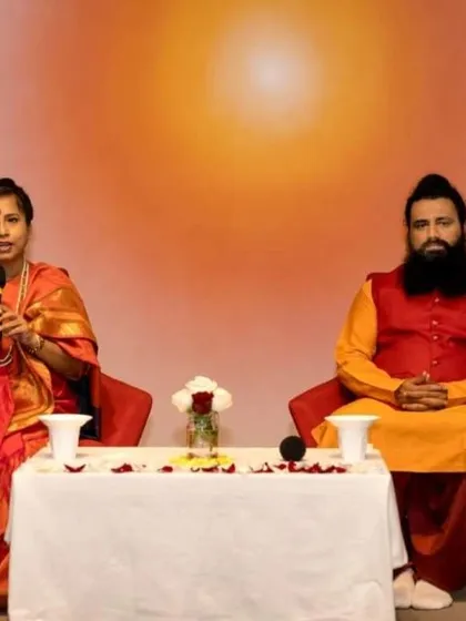 A duplicate of image 28, showing Maa Aditiji speaking at the Sydney event. This highlights the importance of the spoken teachings in our Satsangs.
