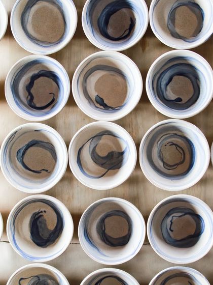 A top-down view of bowls with a simple, elegant brushstroke design. This is a style I often use for custom commissions, creating pieces that are both beautiful and functional.