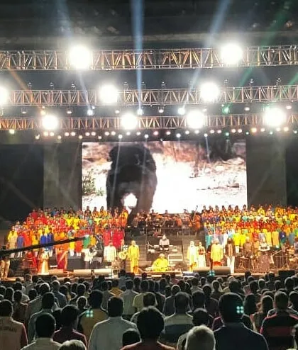 Performing on a grand stage for a massive audience during a concert with Ricky Kej. I am comfortable and experienced in delivering powerful performances for large-scale cultural and corporate events.