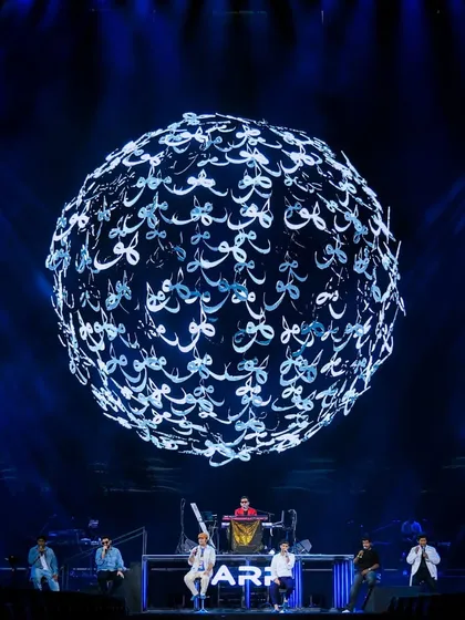 Our visual content is deeply integrated with the artist's identity. For A.R. Rahman's performance, we designed this stunning LED graphic, a sphere of Arabic calligraphy, creating a powerful and culturally rich backdrop for his music.