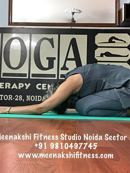 Finding moments of complete rest is essential. The Child's Pose, or Balasana, is a gentle posture we use to release tension in the back and shoulders, allowing you to connect with your breath and find stillness.