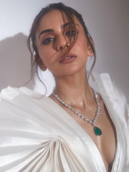 A full look at the Tanieya Khanuja gown for Rakul Preet Singh. The combination of the pleated, sculptural top and a sequined pencil skirt made for a standout ensemble at the Pinkvilla Style Awards.