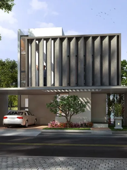The Nayak Residence showcases our application of green building principles in a contemporary design. The large concrete fins are not just a strong visual element; they provide passive cooling by shading the interiors, reducing energy consumption while ensuring privacy.