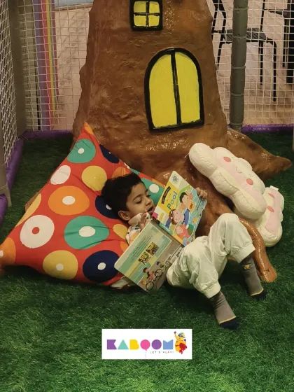 So engrossed in a story that he had to lie down! Our reading nook is comfy and inviting.