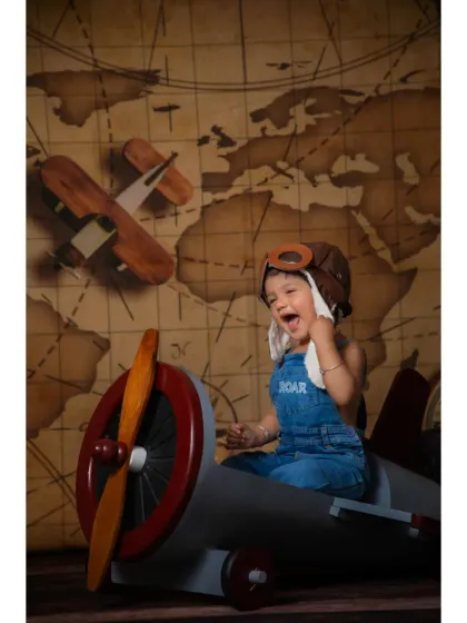 A joyful shout from the cockpit. We love capturing these energetic and expressive moments during our themed photoshoots.
