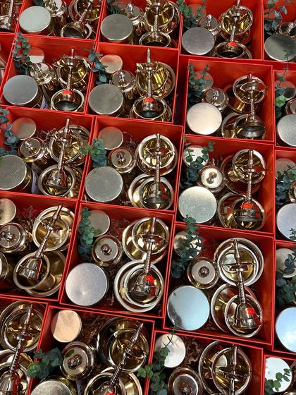 A glimpse into a large Diwali order for Reliaable Developers. We curated hundreds of these festive red boxes, each containing a beautiful brass puja set. It’s a traditional and timeless gift for the festival of lights.