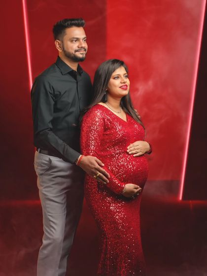 A stylish couple's portrait, capturing a moment of shared anticipation and future dreams.