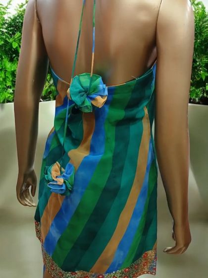 The back of this halter sharara set features delicate floral appliqué details. It’s these little touches that make an outfit truly special and unique.