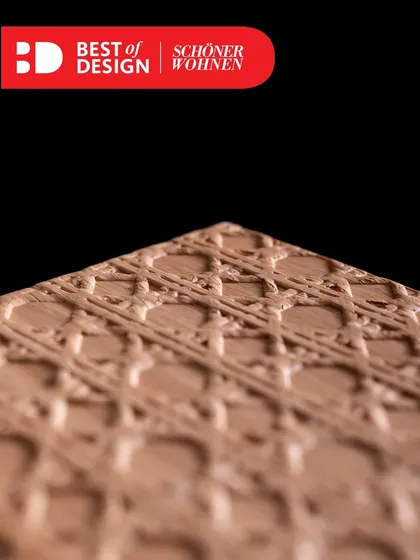 A close-up of the award-winning Viennese wickerwork veneer, showcasing the intricate detail and craftsmanship that goes into this unique finish.