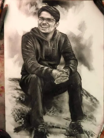 A full-body charcoal sketch of a man sitting casually. The medium is perfect for capturing the texture of his clothes and his relaxed posture.