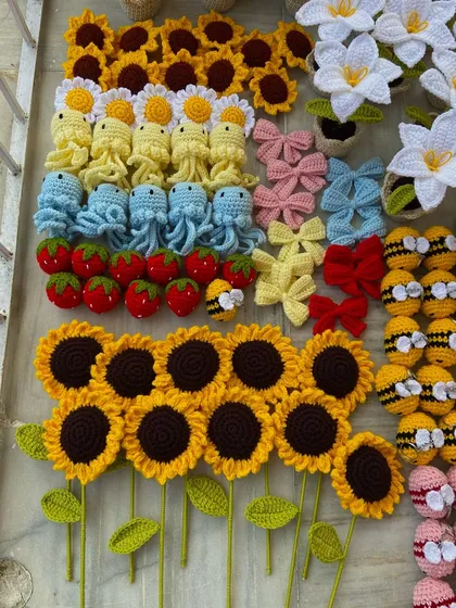 A close-up of the amigurumi section of the large order, showing the detail on each character.