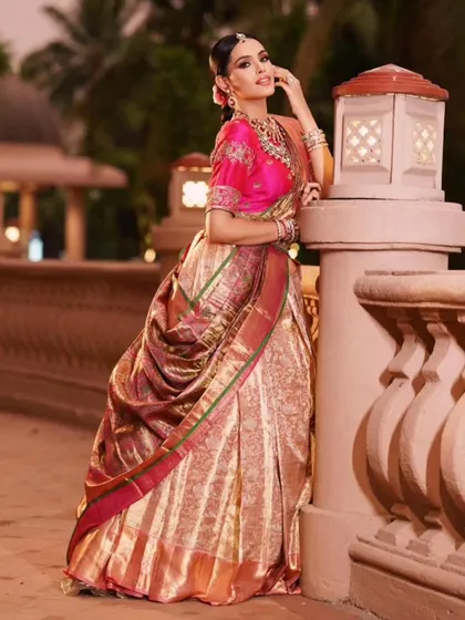 I love transforming a traditional Kanjeevaram silk saree into a contemporary lehenga style. This look is perfect for a sangeet or reception, and I can show you how to create this stunning silhouette that combines comfort with regal elegance.