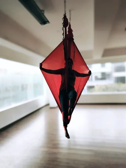 More moments from our vibrant aerial and acro yoga classes, showcasing the variety of poses, the supportive environment, and the pure fun of flying. From beginner drops to advanced flows and teacher trainings, there's a place for everyone to explore.