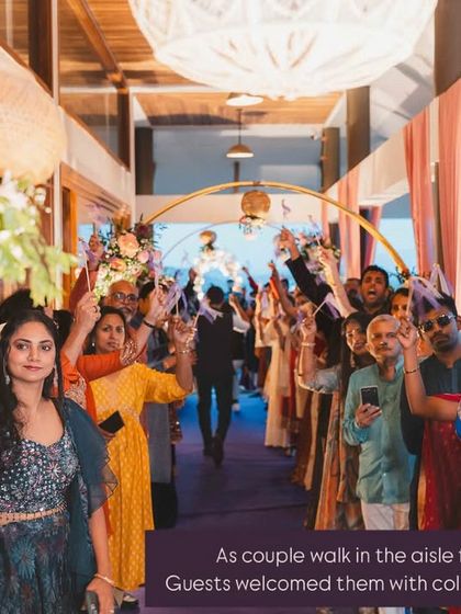 The bride's grand entrance on a floral palanquin, surrounded by dhol players. This was a high-energy and beautiful moment we curated for a destination wedding in the hills.