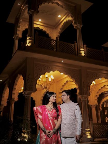 A grand, architectural shot. The makeup is bold enough to stand out and complement the majestic background.