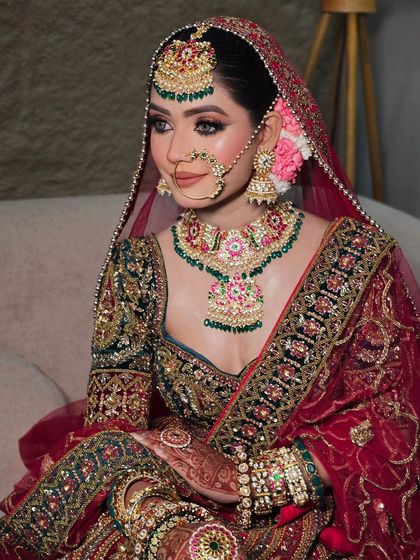 Another angle of this regal bridal look, showing the fine craftsmanship of the lehenga and the way the colors work together.