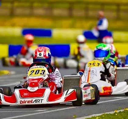 A Birel ART driver leads a tight pack of karts in the WSK Euro Championship in Adria, Italy, demonstrating our competitiveness on the international stage.