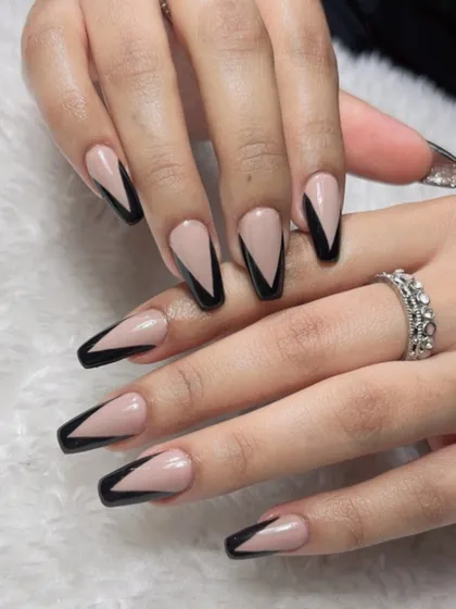 This V-shape French manicure is a modern classic. This is an example of the clean, precise work our students produce after completing their training.