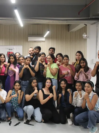 The confident faces of women after completing a self-defense workshop, ready to be their own protectors.