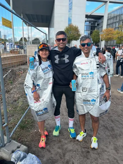 The support crew is just as important. Coach with our runners after they completed the Berlin Marathon.