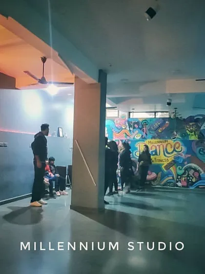 A glimpse of our Millennium Studio in Greater Noida. We've created a space that is both energetic and peaceful, with a vibrant graffiti wall and an open floor for you to practice and grow.