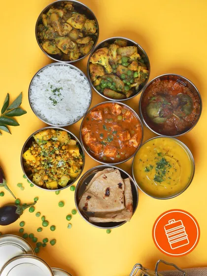 Wondering what's on the menu? A little bit of everything! We pack variety into our steel dabbas, from comforting dal and paneer to seasonal sabzis, so your lunch is never boring.