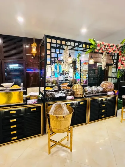 A modern and elegant choice for any reception. This beautiful black and gold buffet setup shows a different style of decor I can arrange, perfect for a chic evening event.