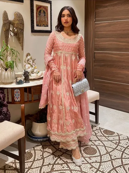 For Ganpati celebrations, I styled Bhumi Pednekar in this lovely pink anarkali suit. The delicate white embroidery and soft fabric make it a comfortable yet festive choice for a day of celebrations.