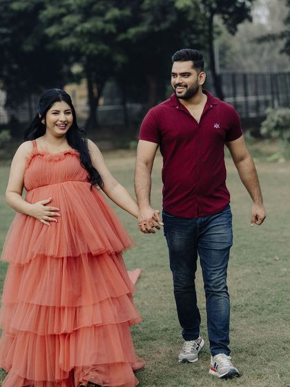 Another shot of the couple walking hand-in-hand. The movement of the gown adds a dynamic and romantic feel to the photo.