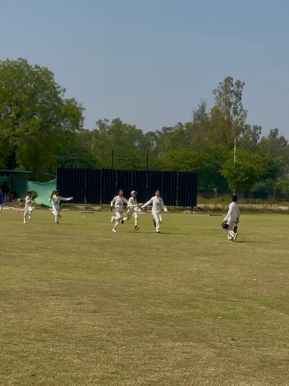 The team running in celebration after hitting the winning runs.