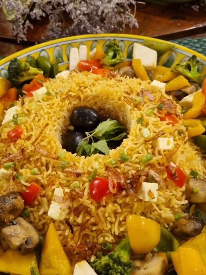 This colourful Mexican Rice is a feast for the eyes and the palate. The rice is cooked with spices and vegetables, then beautifully arranged with bell peppers, broccoli, paneer, and olives.
