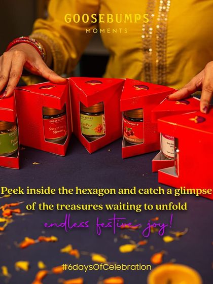 Peek inside the hexagon to see the treasures waiting to unfold. Each of the six compartments holds a jar of my artisanal snacks, like Pani Puri Cashews and Masala Cranberry, for endless festive joy.
