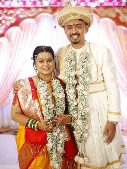 A classic wedding portrait. The bride's makeup is natural and enhances her features, making her look timelessly beautiful.