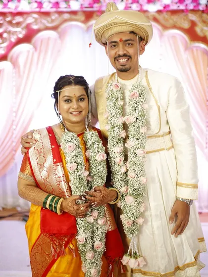 A classic wedding portrait. The bride's makeup is natural and enhances her features, making her look timelessly beautiful.