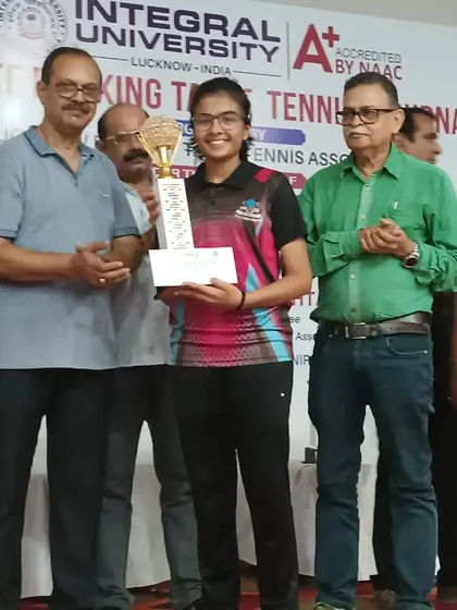 Samriddhi Sharma proudly accepts her first Gold Medal at the UP State Ranking Tournament in Lucknow after two years of relentless training.