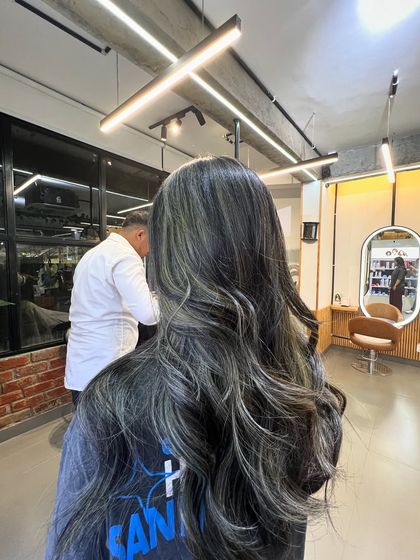 Another view of the silver-toned lived-in color, showing how it looks from the back in our salon.